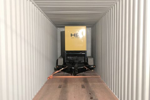 Industrial portable generator in shipping container.